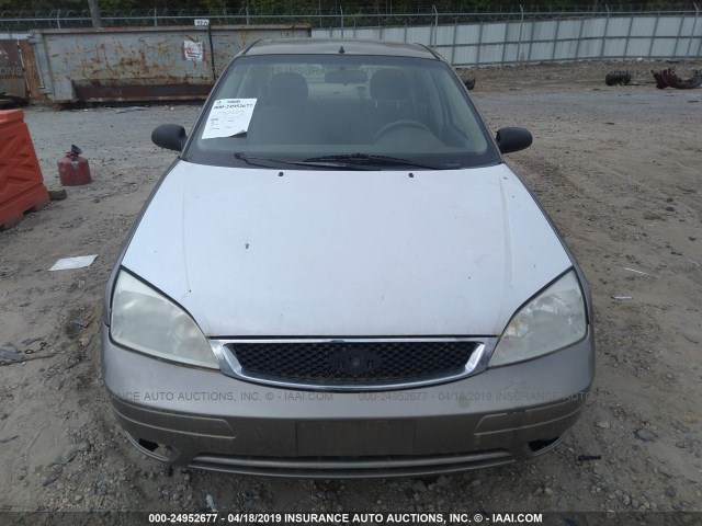 1FAFP34N85W310629 - 2005 FORD FOCUS ZX4 GOLD photo 6