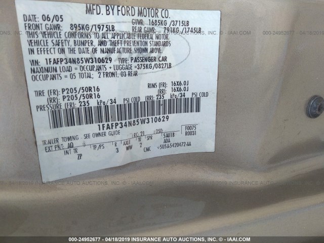 1FAFP34N85W310629 - 2005 FORD FOCUS ZX4 GOLD photo 9