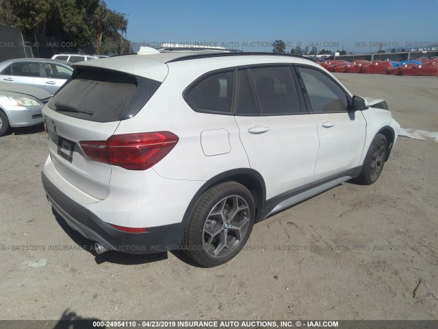 WBXHU7C35H5H37706 - 2017 BMW X1 SDRIVE28I WHITE photo 4