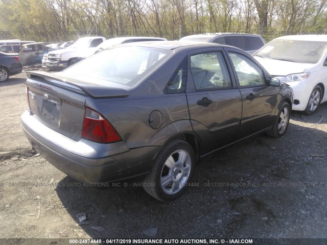 1FAHP34N77W264156 - 2007 FORD FOCUS ZX4/S/SE/SES GRAY photo 4