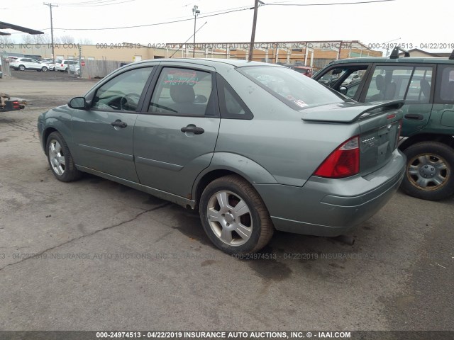 1FAFP34N75W125343 - 2005 FORD FOCUS ZX4 GRAY photo 3