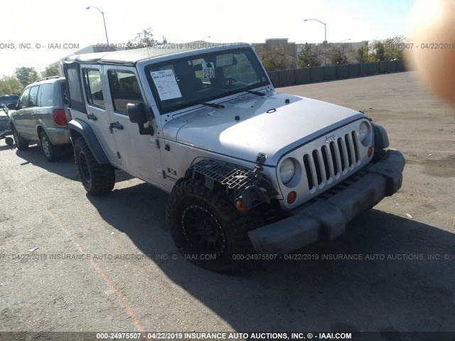 1J4GA39179L771439 - 2009 JEEP WRANGLER UNLIMITED X SILVER photo 1