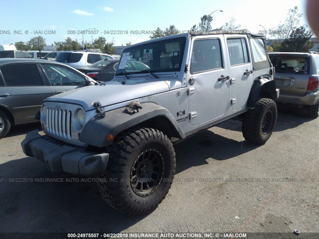 1J4GA39179L771439 - 2009 JEEP WRANGLER UNLIMITED X SILVER photo 2