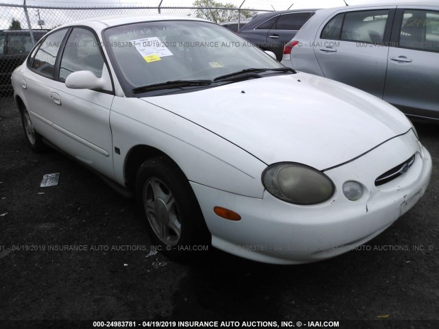 1FAFP53S4XA308167 - 1999 FORD TAURUS SE/COMFORT/SPORT WHITE photo 1