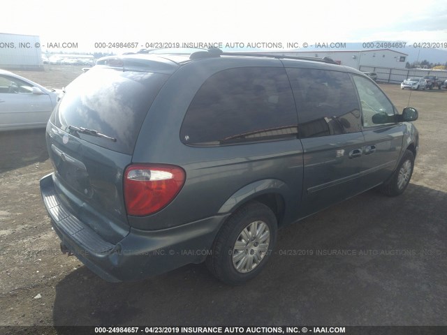 1A4GP44R66B568111 - 2006 CHRYSLER TOWN & COUNTRY LX BLUE photo 4