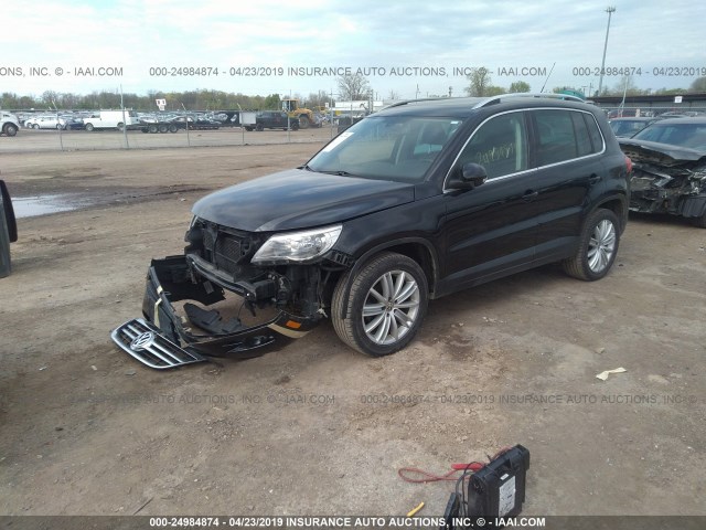 WVGAV7AX5BW520037 - 2011 VOLKSWAGEN TIGUAN S/SE/SEL BLACK photo 2