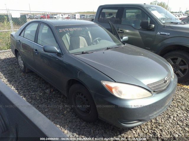 JTDBE32K930159811 - 2003 TOYOTA CAMRY LE/XLE GREEN photo 1
