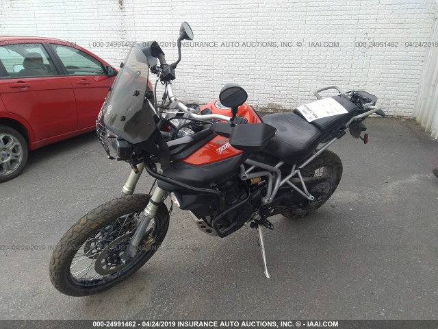 SMTE06BF1BJ497178 - 2011 TRIUMPH MOTORCYCLE TIGER 800XC ABS RED photo 2