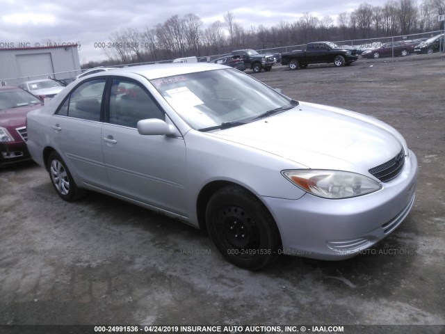 4T1BE32K12U519463 - 2002 TOYOTA CAMRY LE/XLE/SE SILVER photo 1