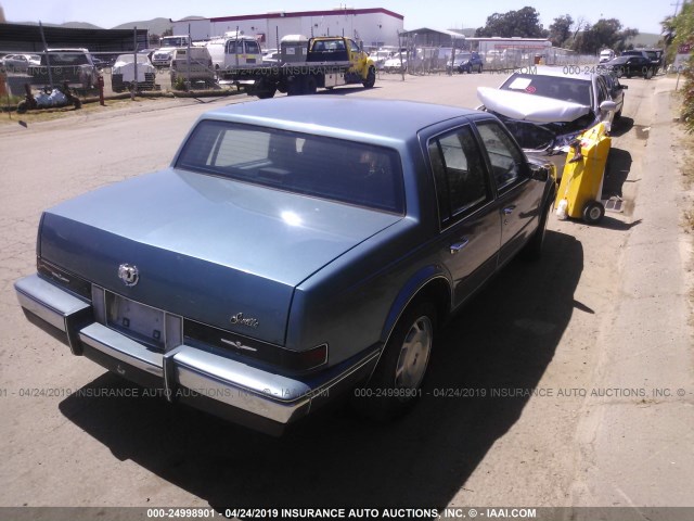 1G6KS6980GU819059 - 1986 CADILLAC SEVILLE BLUE photo 4