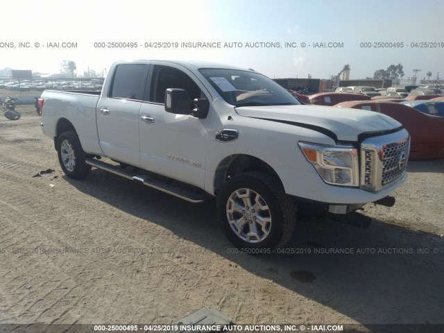 1N6AA1F2XHN550978 - 2017 NISSAN TITAN XD SL/PLATINUM RESERVE/SV WHITE photo 1