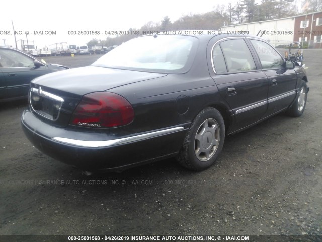 1LNHM97V0YY885404 - 2000 LINCOLN CONTINENTAL  BLACK photo 4