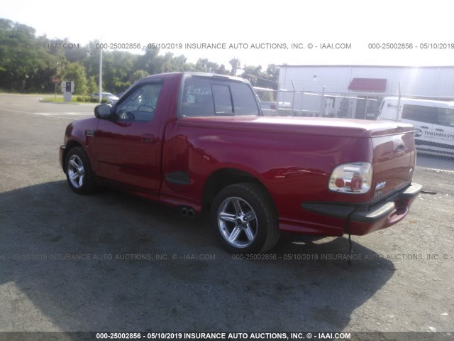 2FTRF07344CA74199 - 2004 FORD F150 SVT LIGHTNING RED photo 3