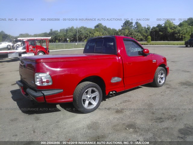 2FTRF07344CA74199 - 2004 FORD F150 SVT LIGHTNING RED photo 4