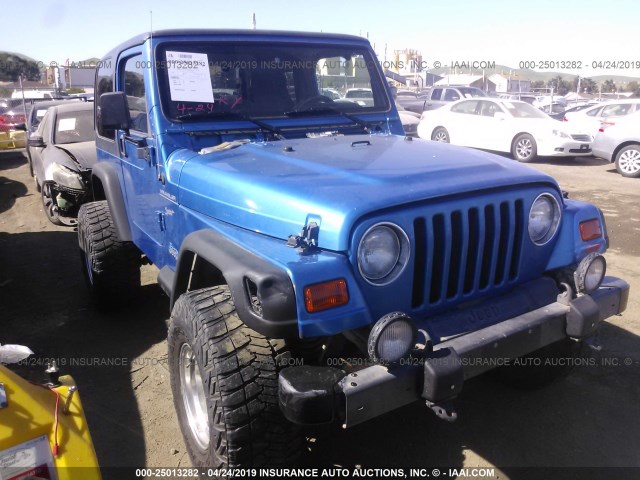 1J4FA49S22P773107 - 2002 JEEP WRANGLER / TJ SPORT BLUE photo 1