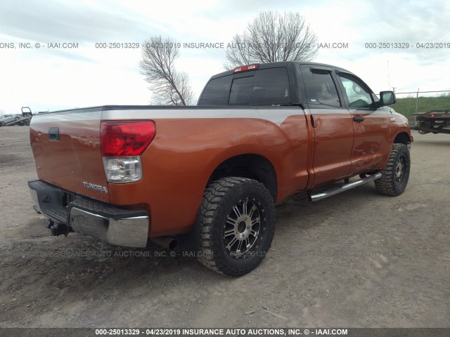 5TFUY5F10BX164303 - 2011 TOYOTA TUNDRA ORANGE photo 4