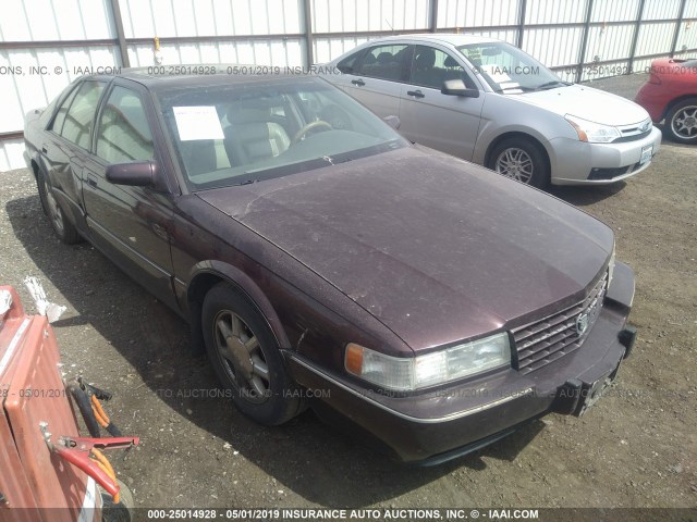 1G6KY5290VU834170 - 1997 CADILLAC SEVILLE STS PURPLE photo 1