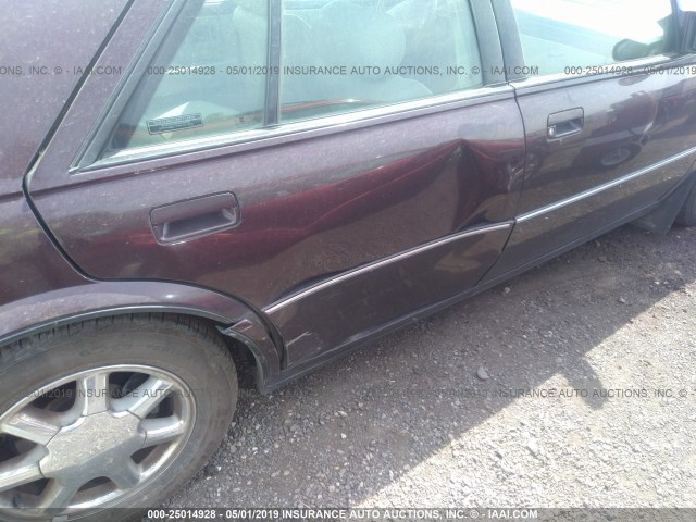 1G6KY5290VU834170 - 1997 CADILLAC SEVILLE STS PURPLE photo 6