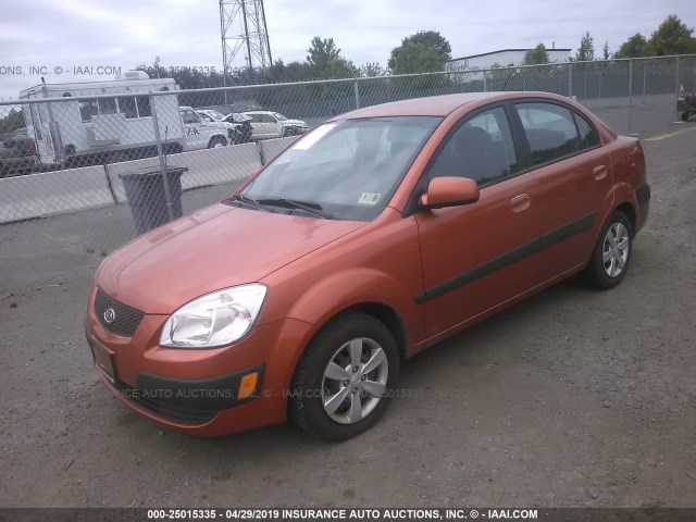 KNADE223196488257 - 2009 KIA RIO LX/SX ORANGE photo 2