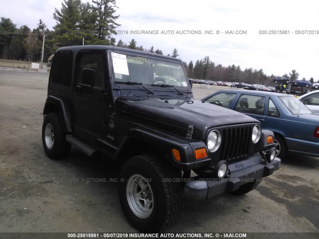 1J4FA59S11P321492 - 2001 JEEP WRANGLER / TJ SAHARA BLACK photo 1