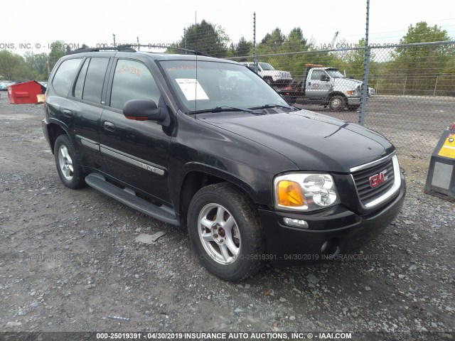 1GKDT13S332144831 - 2003 GMC ENVOY BLACK photo 1