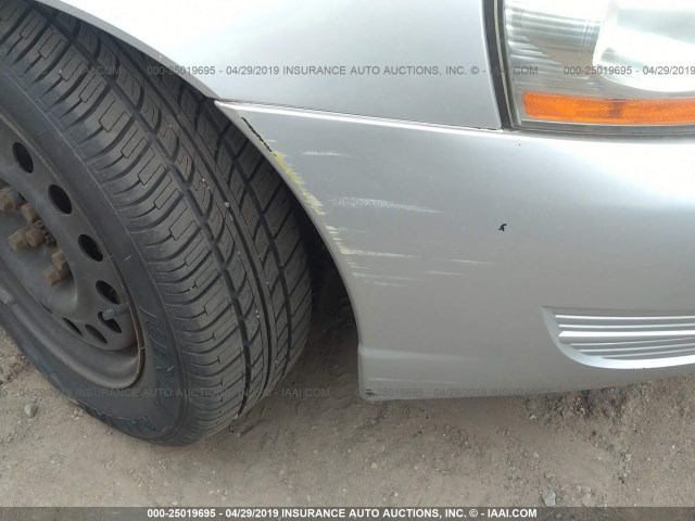 1G8JU54F93Y577856 - 2003 SATURN L200 SILVER photo 6