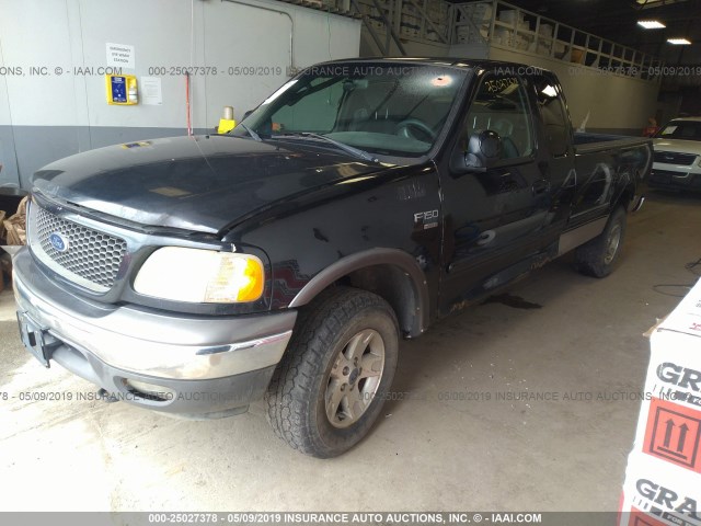 1FTRX18LX3NA87047 - 2003 FORD F150 BLACK photo 2