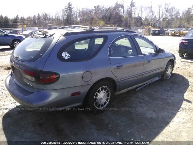 1FAFP58S8XA169850 - 1999 FORD TAURUS SE COMFORT BLUE photo 4