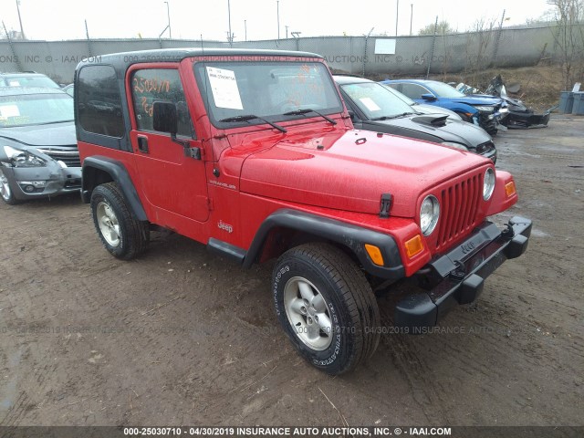 1J4FA29P3YP768099 - 2000 JEEP WRANGLER / TJ SE RED photo 1