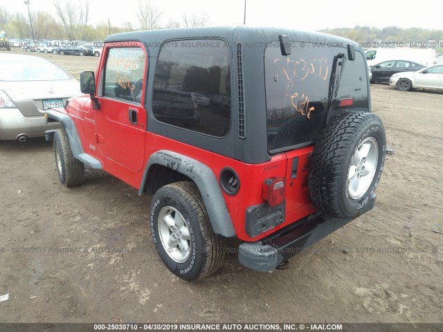 1J4FA29P3YP768099 - 2000 JEEP WRANGLER / TJ SE RED photo 3