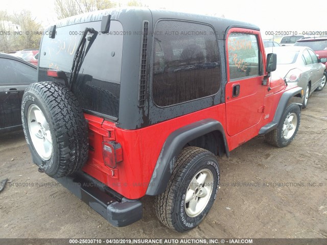 1J4FA29P3YP768099 - 2000 JEEP WRANGLER / TJ SE RED photo 4