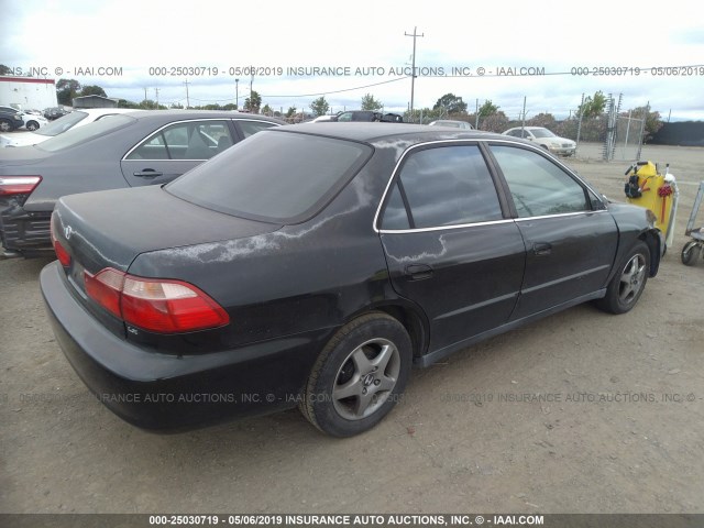 1HGCG6653XA082584 - 1999 HONDA ACCORD LX BLACK photo 4