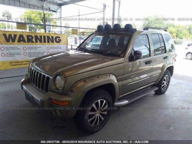 1J4GL38K32W331405 - 2002 JEEP LIBERTY RENEGADE GOLD photo 2