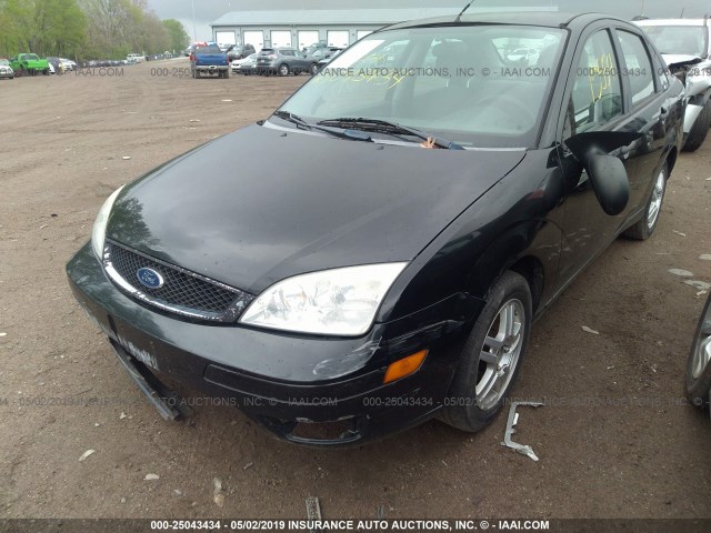 1FAFP34N76W244088 - 2006 FORD FOCUS ZX4 BLACK photo 6