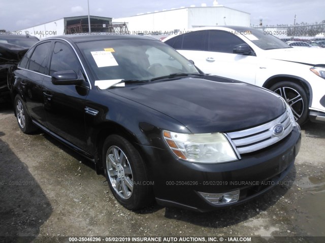 1FAHP24W49G107863 - 2009 FORD TAURUS SEL BLACK photo 1