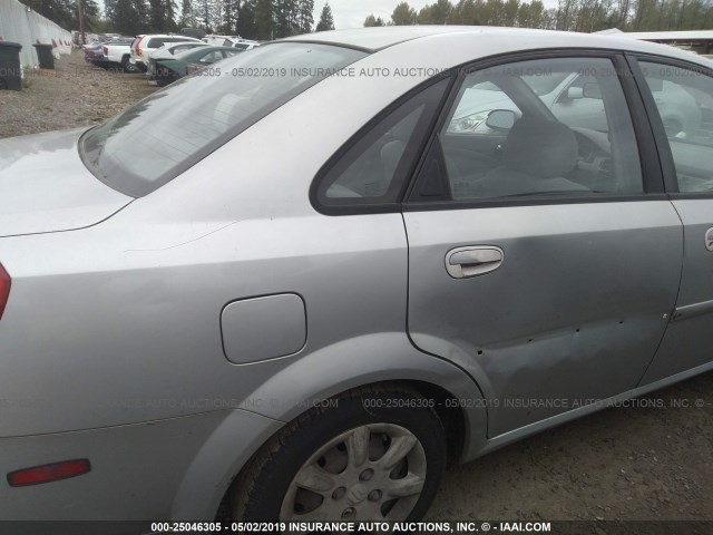 KL5JD52Z54K009066 - 2004 SUZUKI FORENZA S SILVER photo 6