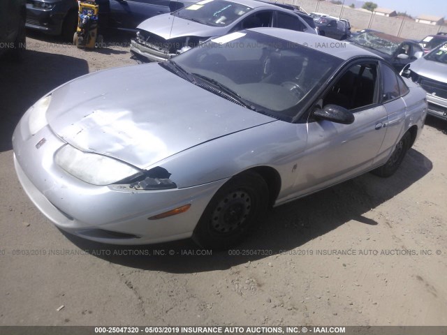 1G8ZY12742Z208861 - 2002 SATURN SC2 SILVER photo 2