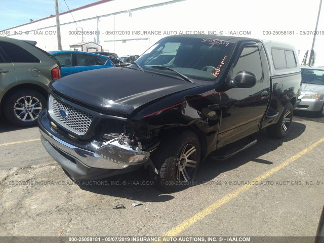 2FTRF07253CA26409 - 2003 FORD F150 BLACK photo 2