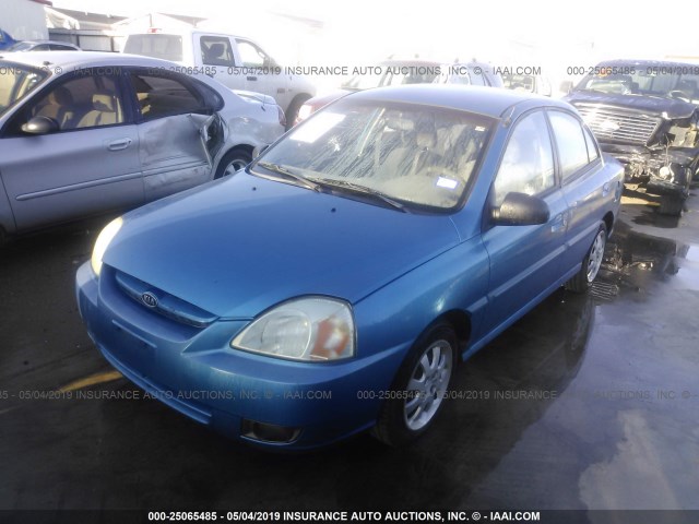 KNADC125036238713 - 2003 KIA RIO BLUE photo 2