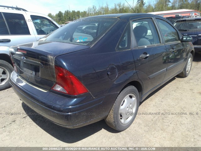 1FAFP33P24W132282 - 2004 FORD FOCUS LX Dark Blue photo 4