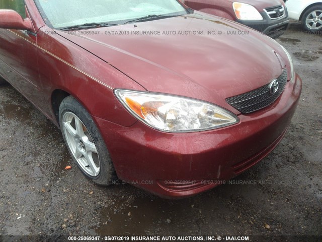 4T1BE32K42U056427 - 2002 TOYOTA CAMRY LE/XLE/SE RED photo 6