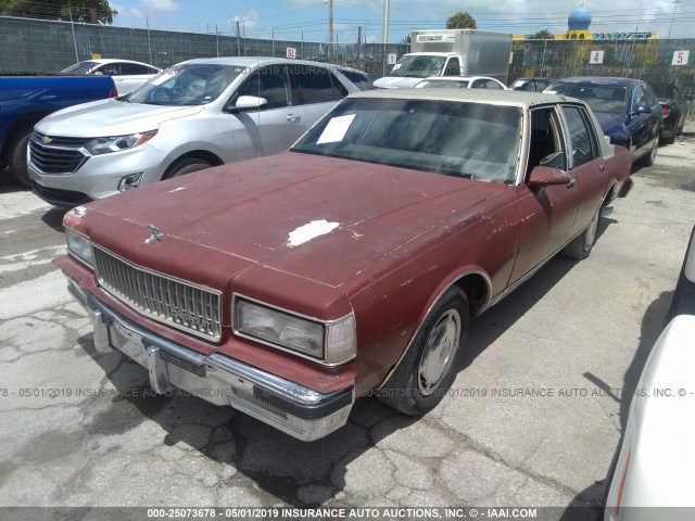 1G1BU51HXHX156878 - 1987 CHEVROLET CAPRICE CLASSIC BROUGHAM RED photo 2