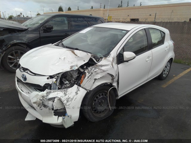 JTDKDTB31D1528202 - 2013 TOYOTA PRIUS C WHITE photo 2