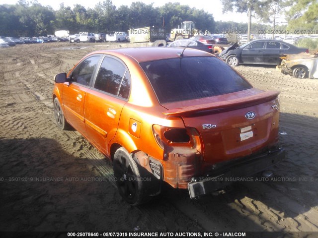 KNADH4A32B6950724 - 2011 KIA RIO LX/SX ORANGE photo 3