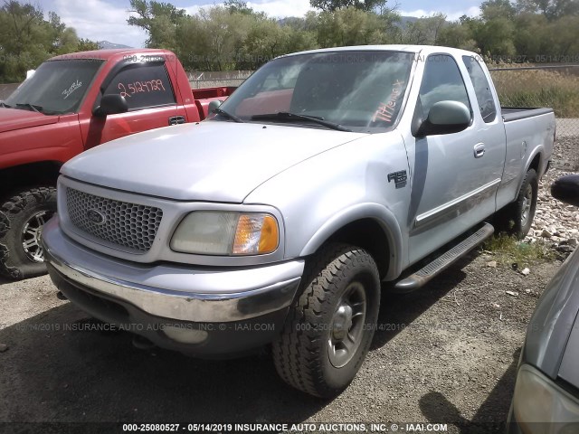 1FTRX18L3XKC20674 - 1999 FORD F150 GRAY photo 2