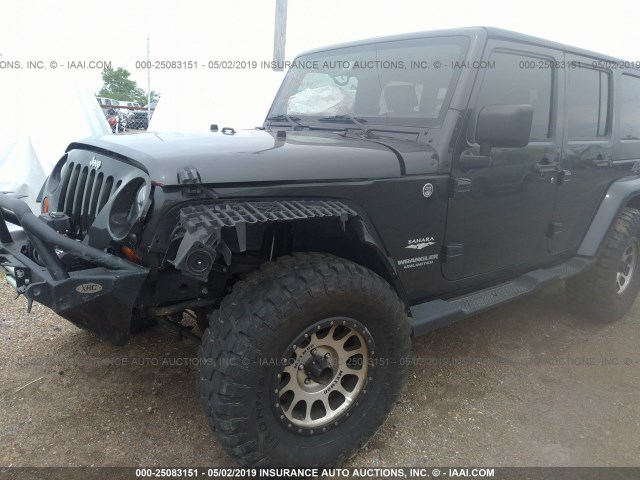 1J4HA5H15AL145183 - 2010 JEEP WRANGLER UNLIMITE SAHARA GRAY photo 6