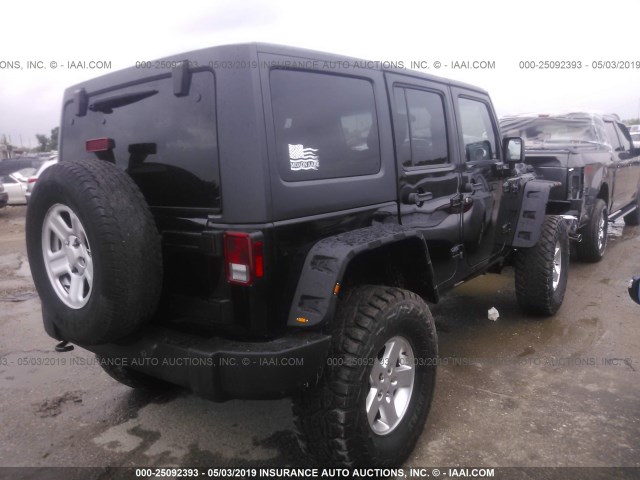 1C4BJWEG8CL286956 - 2012 JEEP WRANGLER UNLIMITE SAHARA BLACK photo 4