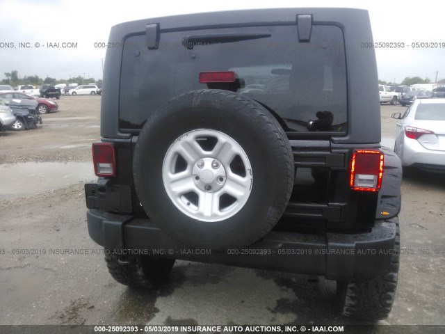 1C4BJWEG8CL286956 - 2012 JEEP WRANGLER UNLIMITE SAHARA BLACK photo 6