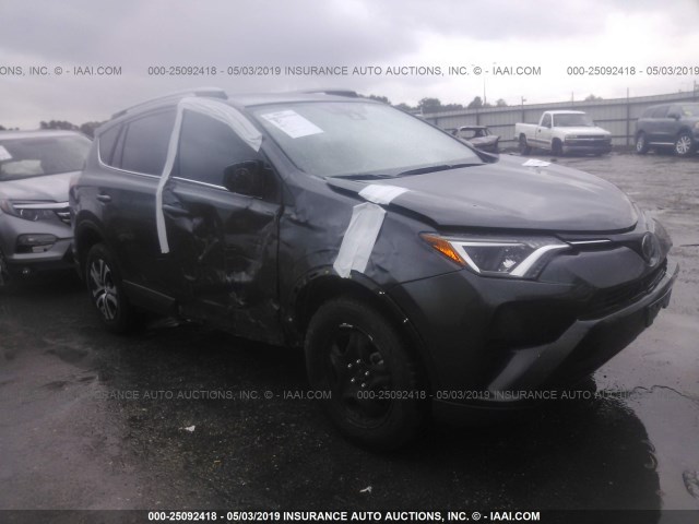 JTMZFREV6JJ738329 - 2018 TOYOTA RAV4 LE GRAY photo 1