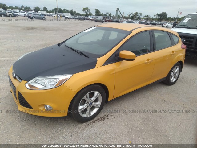 1FAHP3K20CL123787 - 2012 FORD FOCUS SE YELLOW photo 2